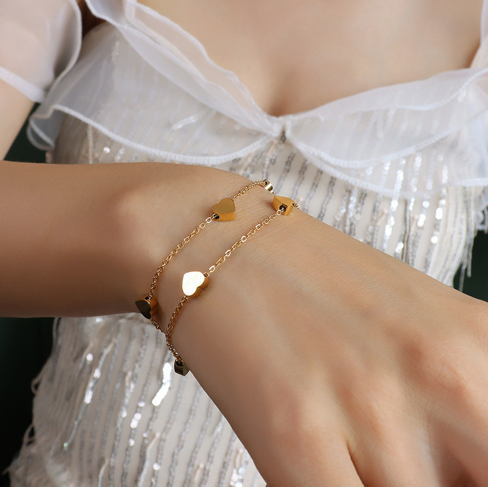 Veyra Damenarmband Doppelherz – Titanstahl Gold