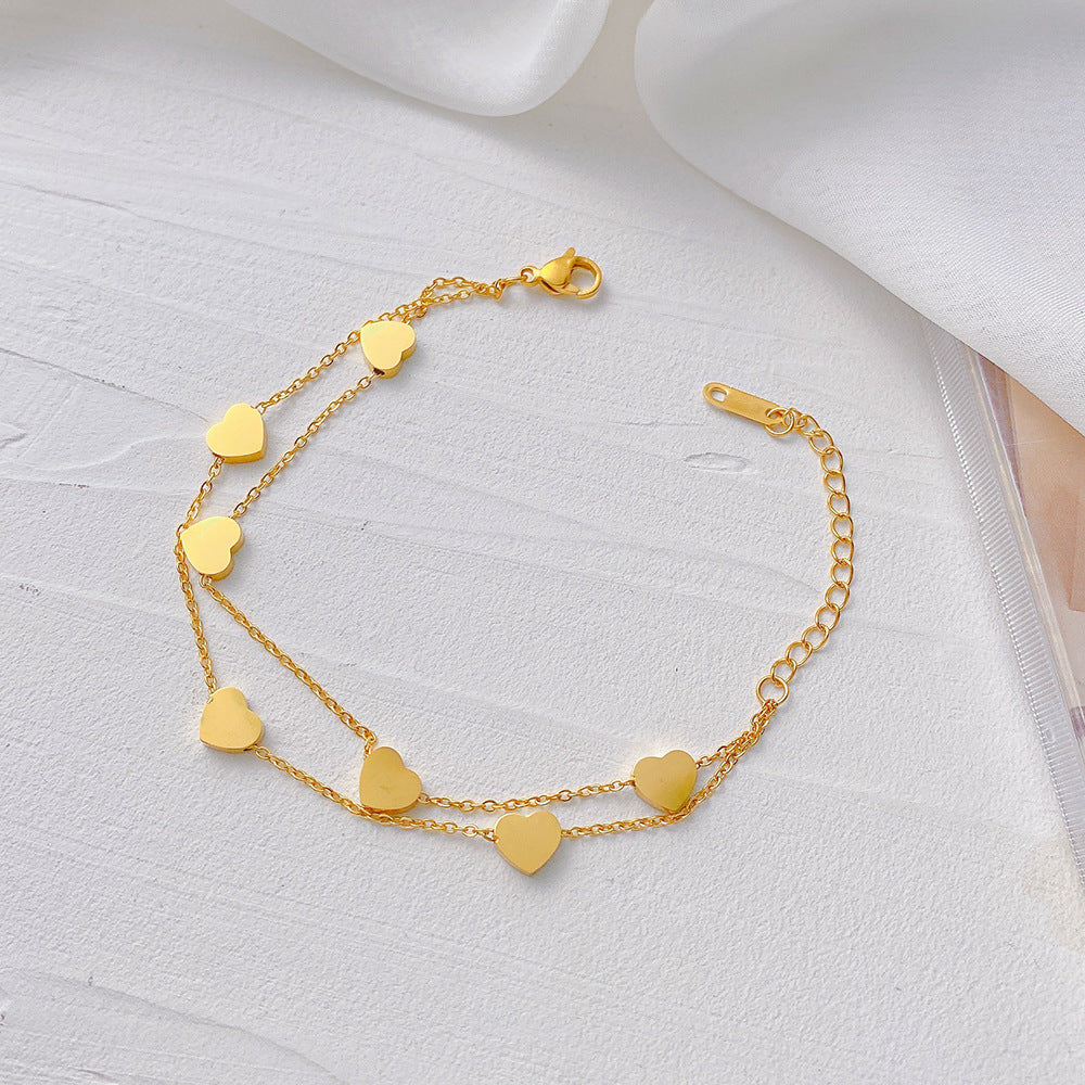 Veyra Damenarmband Doppelherz – Titanstahl Gold